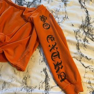 Fashion Nova; Orange, Off the Shoulders Top, “So Extra” on Sleeves, Tie in front